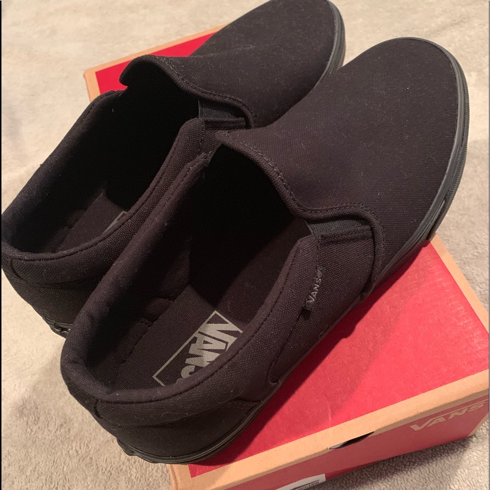 Vans black classic slip on